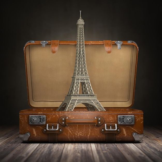 Viaje a París Viaje o turismo a Francia concepto torre Eiffel y maleta vintage