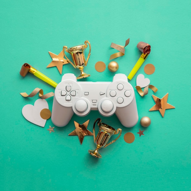 Foto videospiel-esports-gewinnspiel-hintergrund-gamecontroller mit goldener trophäe