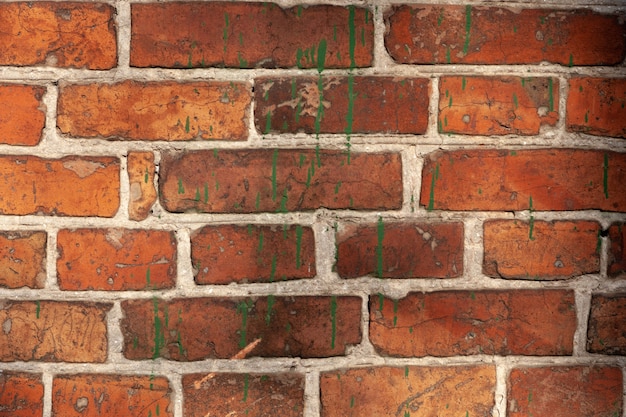 Vieja pared de ladrillo, textura grunge de piedra roja bloques de primer plano