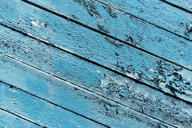 Vieja pared de madera verde con textura de fondo de pintura agrietada Foto de alta calidad