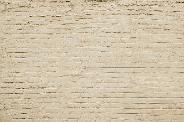 Foto vieja textura de fondo de pared de ladrillo beige