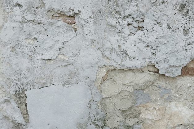 Vieja textura gris del fondo del muro de cemento