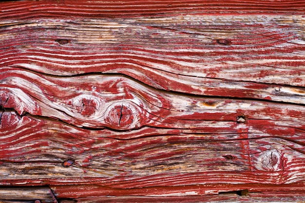 Vieja textura de madera puerta roja grunge