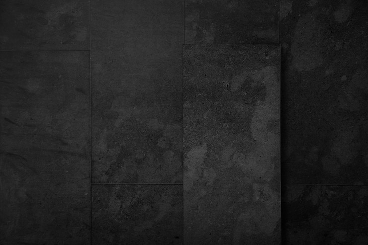 Foto vieja textura de pared de hormigón negro. fondo grunge