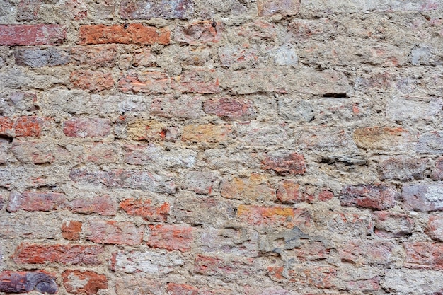 Vieja textura de pared de ladrillo de Siena, región de Toscana, Italia