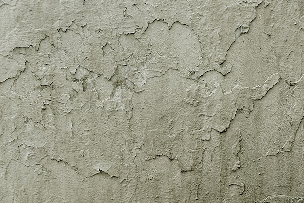 Foto vieja textura pintada agrietada gris del fondo de la pared