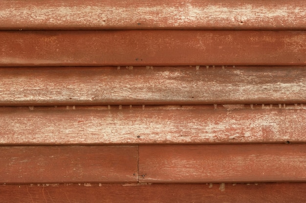 Viejo fondo de madera marrón de la pared del tablón