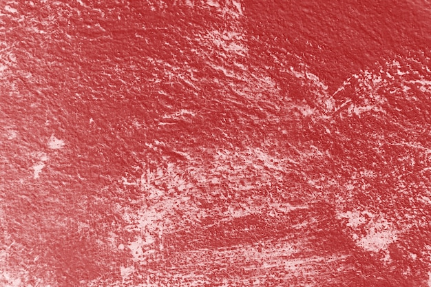 Viejo fondo rojo de la textura de la pared de la vendimia con los rasguños.