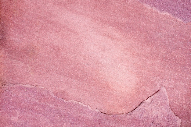 Viejo fondo de la textura de la pared de la piedra arenisca roja.