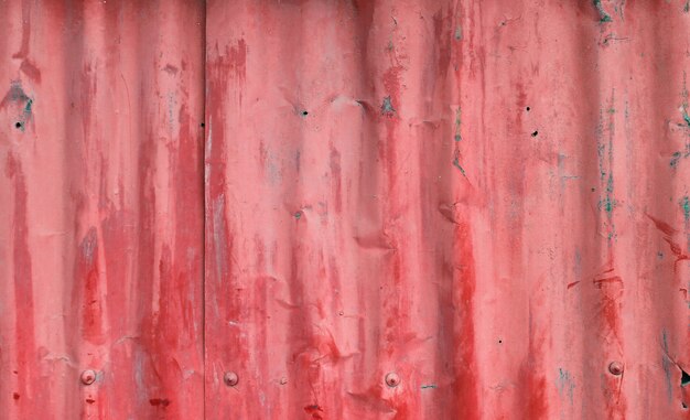 Viejo fondo de textura de pared de zinc rojo