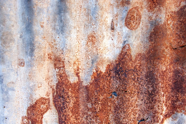 Foto viejo fondo de la textura del tejado del cinc, fondo colorido corroído del metal aherrumbrado