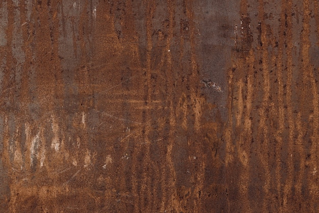 Viejo panel de pared de metal oxidado, textura de óxido de hierro para el fondo.