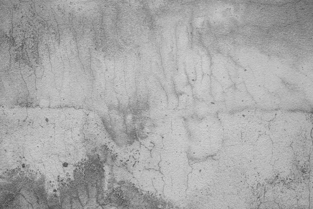 Viejo piso de concreto en color blanco y negro cemento roto sucio textura de fondo