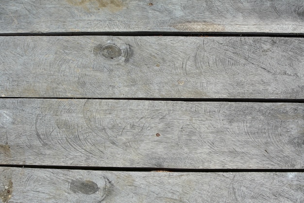 Viejo piso de madera oscuro de la textura, fondo de madera natural