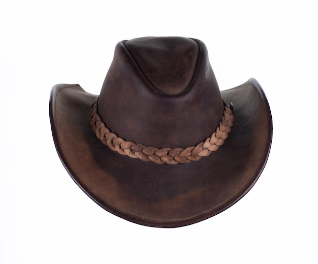 Foto viejo sombrero de vaquero marrón de cuero aislado sobre fondo blanco