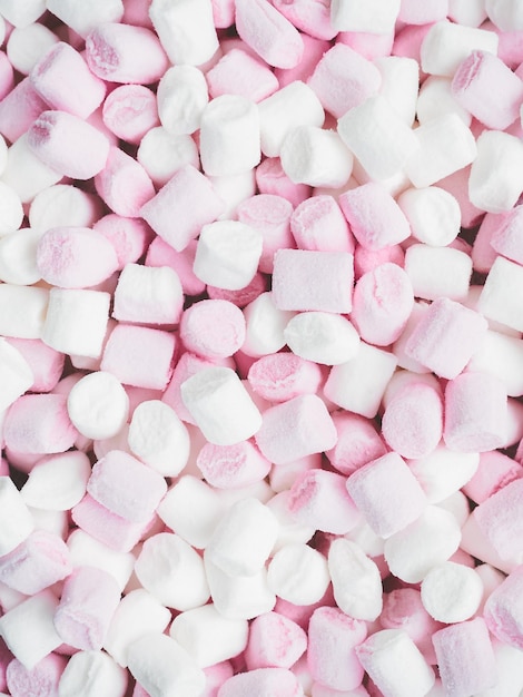 Viele kleine rosa und weiße Marshmallows-Lebensmittelhintergrund