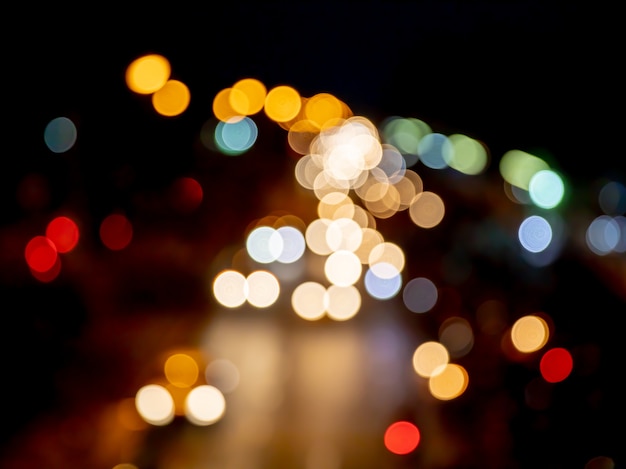 Foto vintage color bokeh en atasco de tráfico ligero de noche