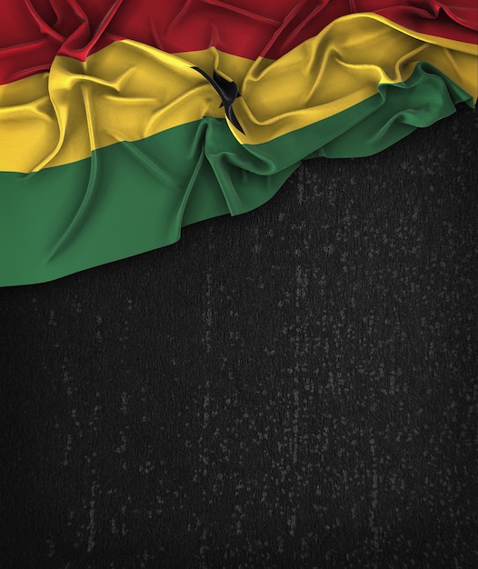 Vintage da bandeira de Ghana em um quadro preto do Grunge com espaço para o texto