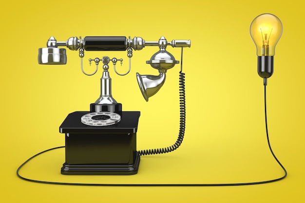 Vintage teléfono conectado a la bombilla de la idea creativa sobre un fondo amarillo. Representación 3D