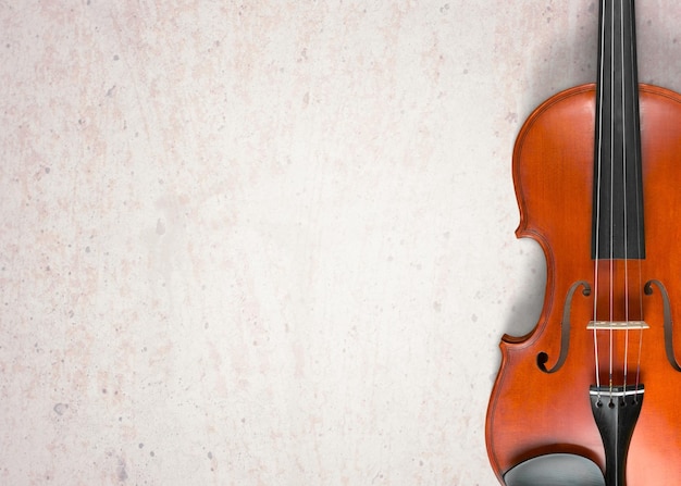 Violino clássico de madeira no fundo