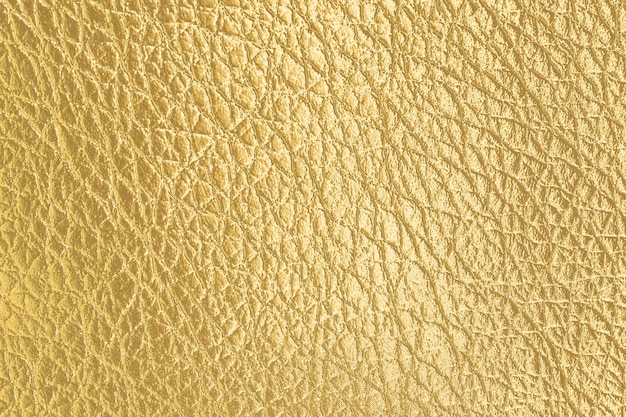 Visão aproximada da superfície dourada brilhante como pano de fundo