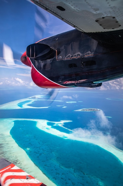 Foto vista aérea das ilhas tropicais das maldivas praia paisagem do atol nas maldivas oceano índico vista de