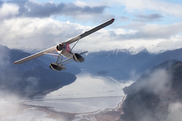 Vista aérea del lago Pitt con paisaje montañoso canadiense con vuelo en hidroavión
