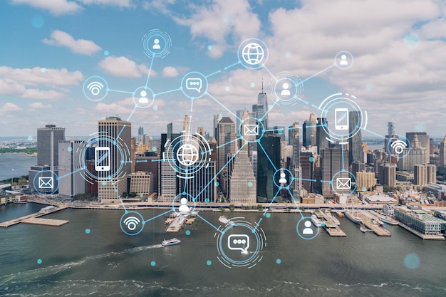 Vista aérea panorámica de la ciudad en helicóptero sobre el distrito del Bajo Manhattan y el centro financiero de Nueva York EE.UU. Holograma de las redes sociales Concepto de creación de redes y establecimiento de nuevas conexiones de personas
