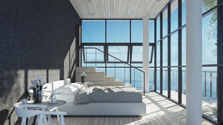 La vista al mar interior del dormitorio moderno para vacaciones y verano renderizado 3D