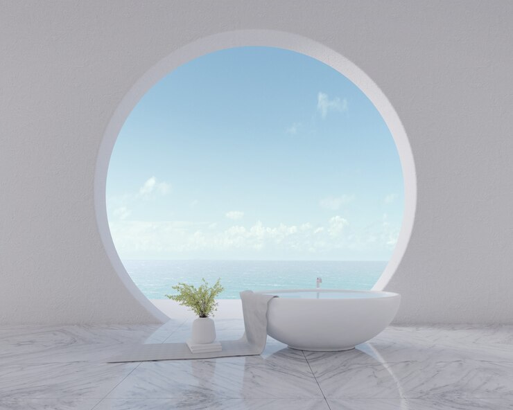 Vista al mar desde la ventana circular con bañera