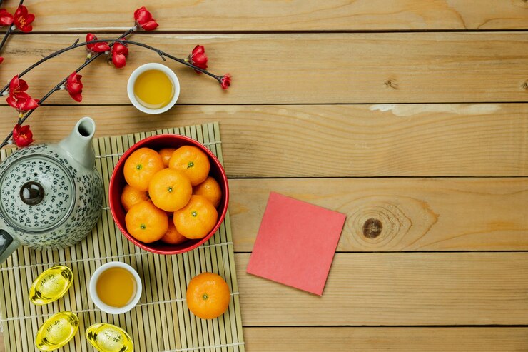 Foto vista de ángulo alto de frutas de naranja en la mesa