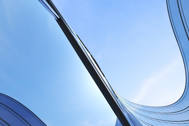 Vista de ángulo bajo de la arquitectura futurista, rascacielos del edificio de oficinas con ventana de cristal curva, renderizado 3D.