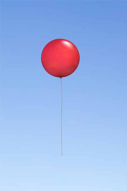 Foto vista de bajo ángulo de un globo volando contra el cielo azul