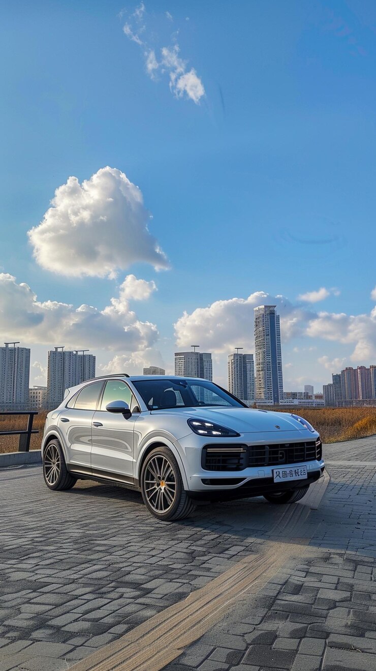 vista arrafada de un Porsche Cayenne blanco estacionado en una carretera de ladrillo generativa ai