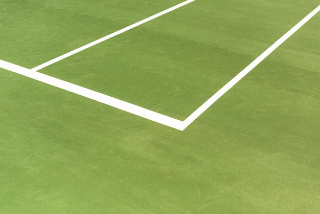 Foto vista cercana de la cancha de tenis verde