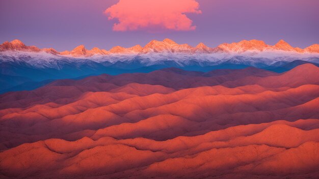 Foto una vista de una cordillera con un cielo rosado