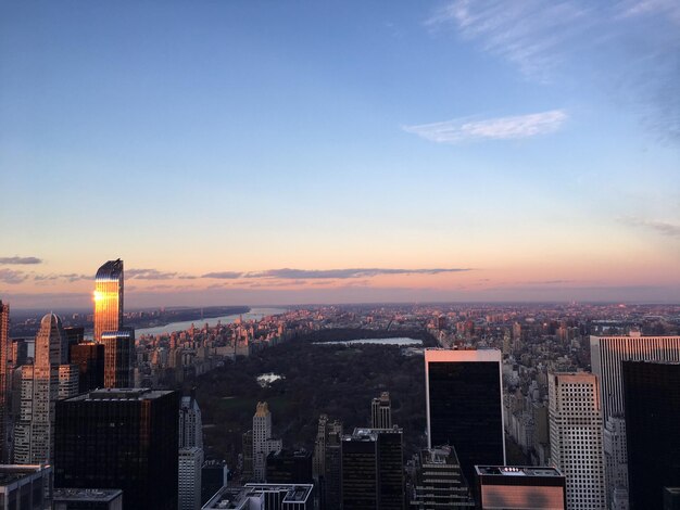 Foto vista da paisagem urbana contra o céu durante o pôr-do-sol