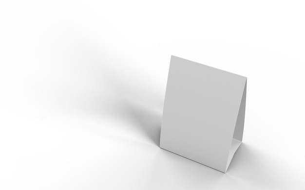 Foto vista de cima para baixo de uma tenda de mesa de papelão branco sobre um fundo branco