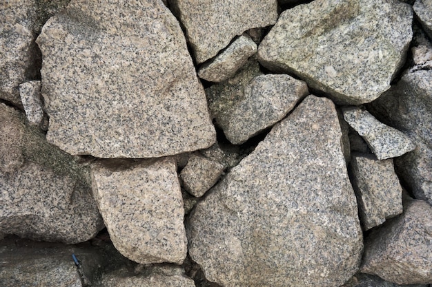Vista de uma textura de parede de pedra cinza
