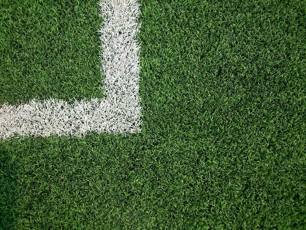 Vista em alto ângulo da marcação de canto no campo de futebol