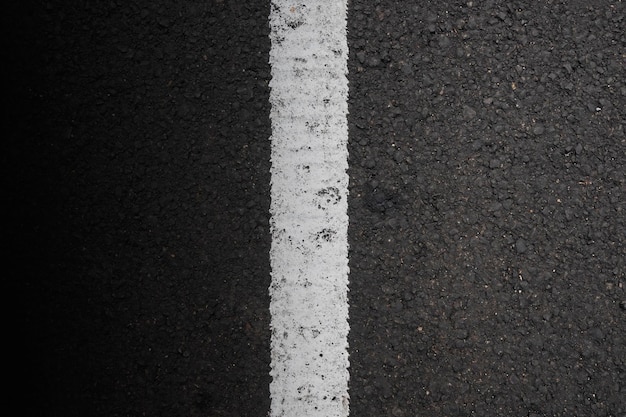 Vista em close do asfalto preto Asfalto preto para o fundo de textura