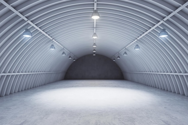 Vista frontal do interior do hangar cinza com holofotes e fundo de carro de piso de concreto e maquete de renderização 3D conceito de palco vazio