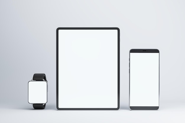 Vista frontal em telas de dispositivos modernos brancos em branco com espaço para seu logotipo ou texto relógios inteligentes tablet digital e smartphone em maquete de renderização 3D de fundo claro