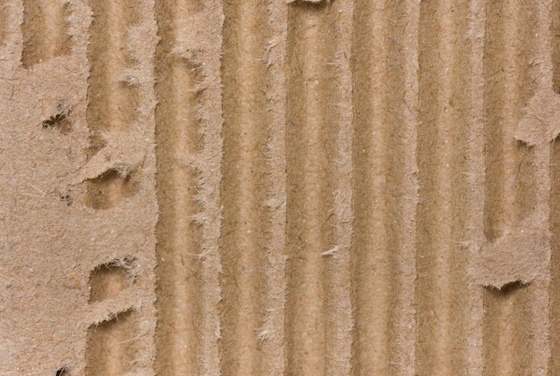 Vista lateral de perto de um fundo de papelão ondulado