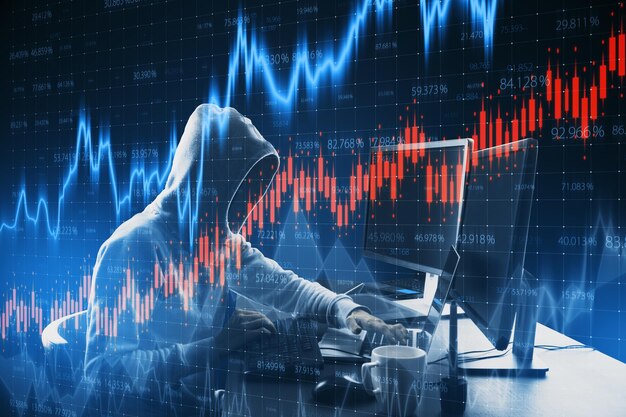 Vista lateral del hacker usando una computadora portátil y una computadora de escritorio con un gráfico de forex brillante y creativo sobre un fondo borroso Concepto de mercado de valores de comercio y finanzas Doble exposición