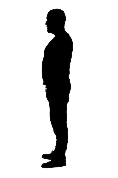 Foto vista lateral de la silueta de un hombre vestido con ropa informal