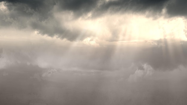 Foto vista de paisajes de nubes oscuras con luz solar