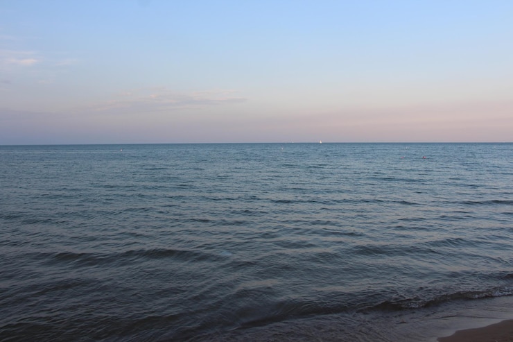 Foto vista panorâmica do mar contra o céu durante o pôr-do-sol