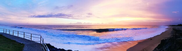 Foto vista panorâmica do mar contra o céu durante o pôr-do-sol