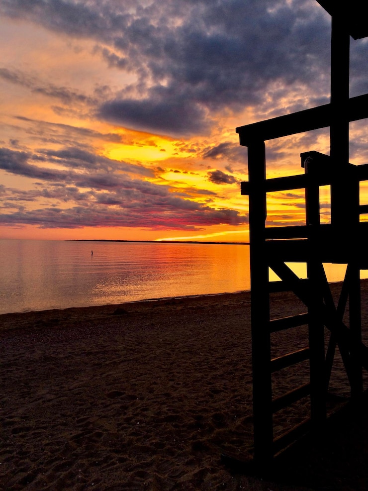 Foto vista panorâmica do mar contra o céu durante o pôr-do-sol